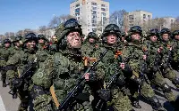 Russian soldiers with exoskeleton under their uniform