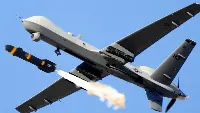 A MQ-9 Reaper that fires a missile