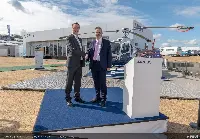 "FIA-2018". H-125 handover: Qinetiq’s Nic Anderson and Airbus Helicopters’ Colin James at the ETPS H-125 handover