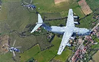The A-400M airplane performs simultaneous refuelling operations of two French Air Force H-225M helicopters