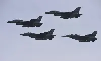 4 Lockheed Martin F-16 aircraft of the Pakistani Air Force in flight