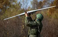 A russian Uav that is launched by a Russian soldier