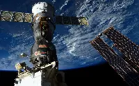 A Soyuz spaceship anchored to the International Space Station