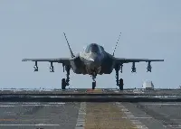 An F-35B on flight deck of aircraft carrier