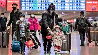 Coronavirus period: passengers with mask in a Chinese airport
