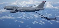A RSAF A-330 MRTT aircraft in a refuelling operation with a RSAF F-15SG fighter airplane