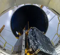 Airbus-built MEASAT-3d being encapsulated on the Ariane 5 launcher
