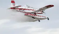 Airtractor Airspray airplane in flight for firefighting operation