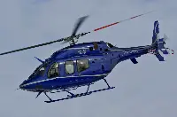 Bell 429 helicopter in flight in an index photo