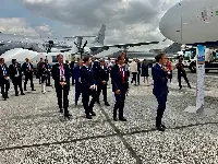 French President Emmanuel Macron visits the exhibition area of the Paris Air Show 2023