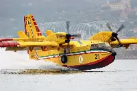 Canadair CL-415 during a water refuelling in a firefighting operation