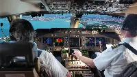 Pilots in an cockpit during a landing