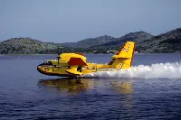 Canadair CL-415 during an action of water refuelling