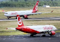 Two Air Berlin aircraft in an airport