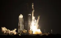 A SpaceX Falcon 9 rocket launches with NASA’s Imaging X-ray Polarimetry Explorer (IXPE) spacecraft onboard from Launch Complex 39A, Thursday, Dec. 9, 2021, at NASA’s Kennedy Space Center in Florida