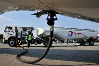 A Total Italia truck refuels an aircraft