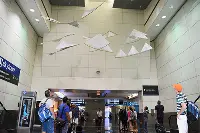 Flying kites at Miami Airport, under latest art installation, "Ando Volando"