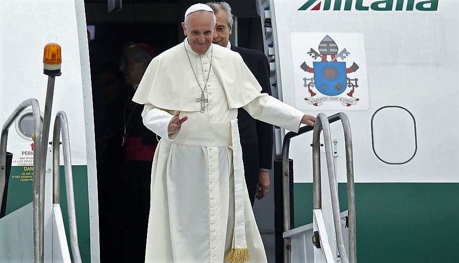 Pope Francis disembarks from an Alitalia plane on the occasion of an apostolic trip