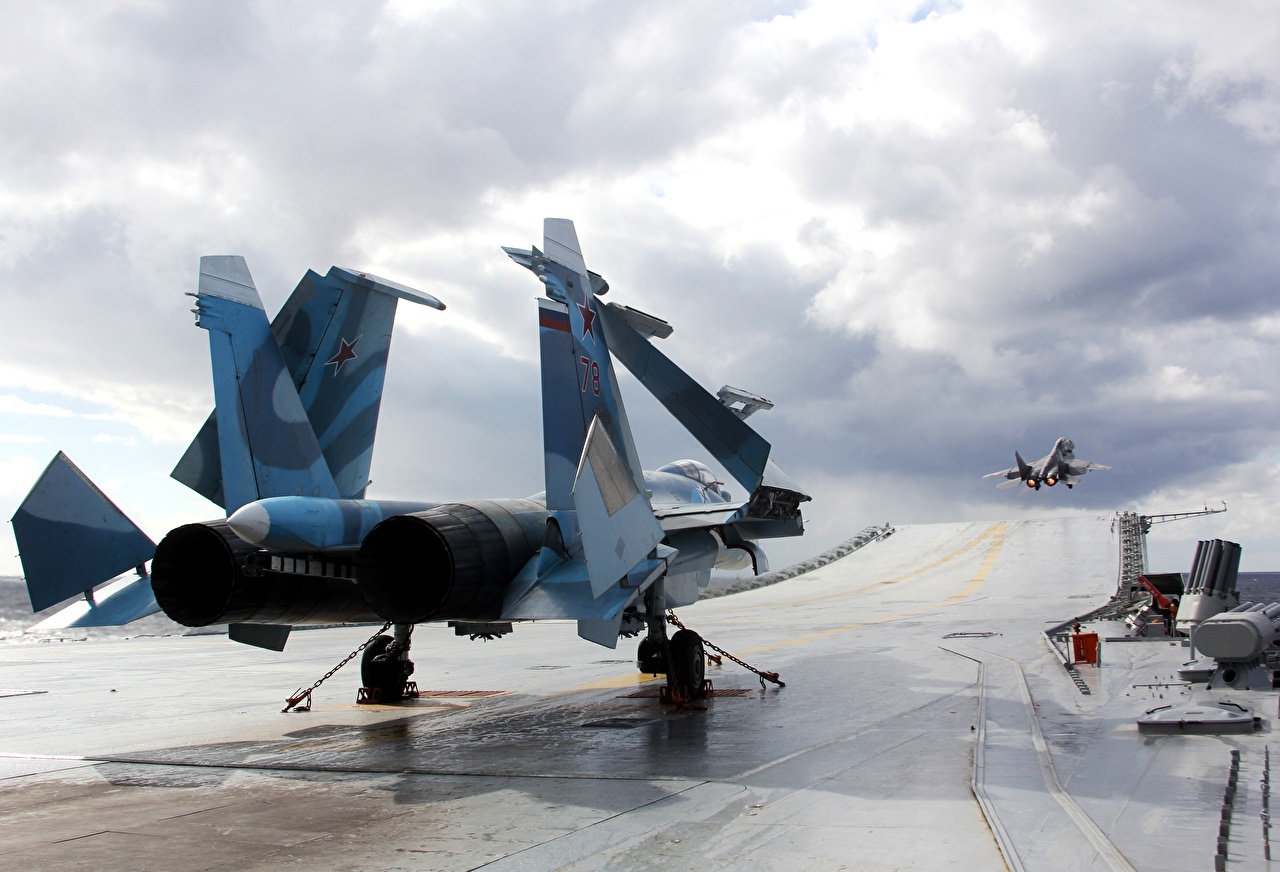 A Sukhoi Su-33 parked on the landing deck of "Admiral Kuznetsov" aircraft carrier