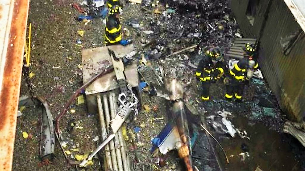 The wreckage of the helicopter crashed on June 10, 2019 on the roof of a skyscraper of New York